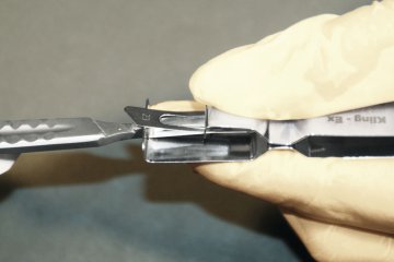 Skalpellklingen-Abnehmer